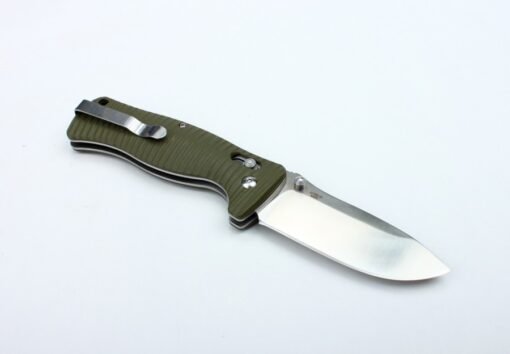 Navaja Ganzo G720 desplegada con clip de sujeción y mango G10 verde